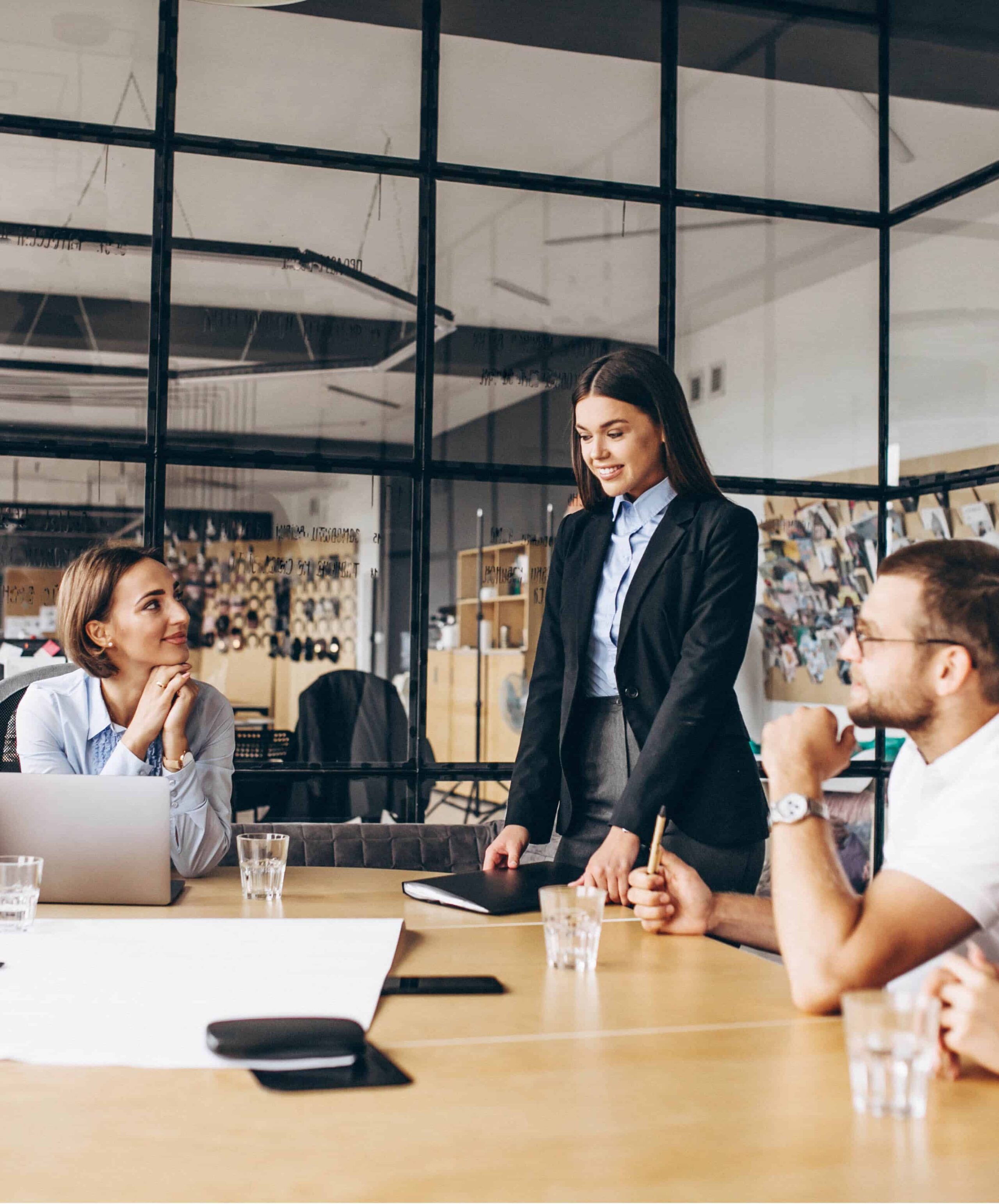 Group of people working out business plan in an office